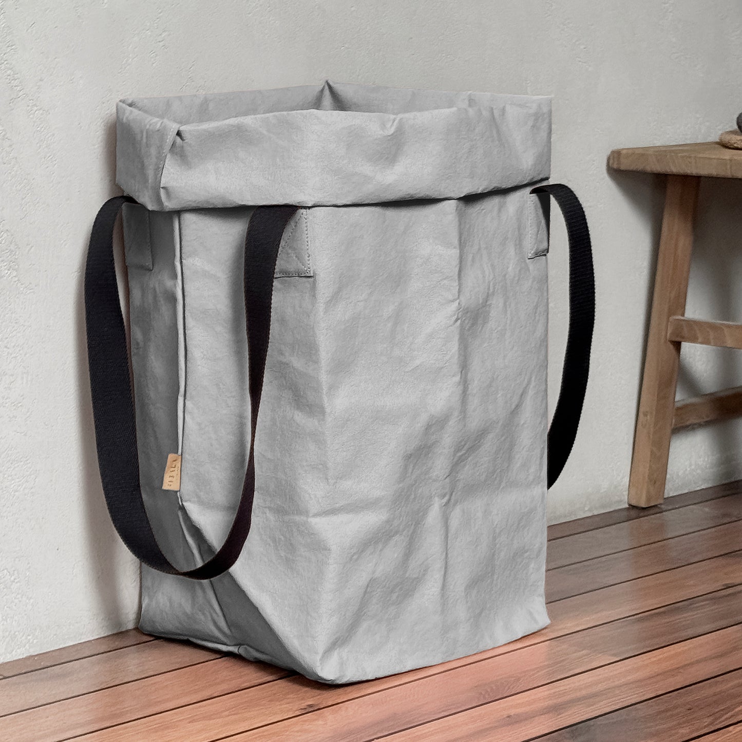 Grey washable paper laundry basket with black cotton handles