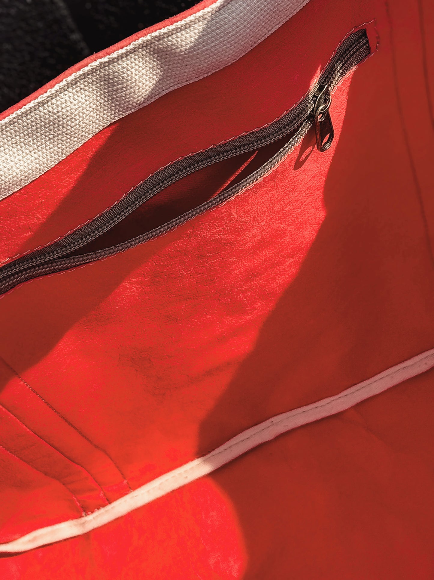 Interior zip pocket of the Large coral washable paper tote bag