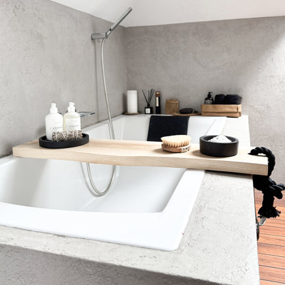 Live-edge ash wood bath caddy, black cotton rope, holds spa essentials on tub rim - front view