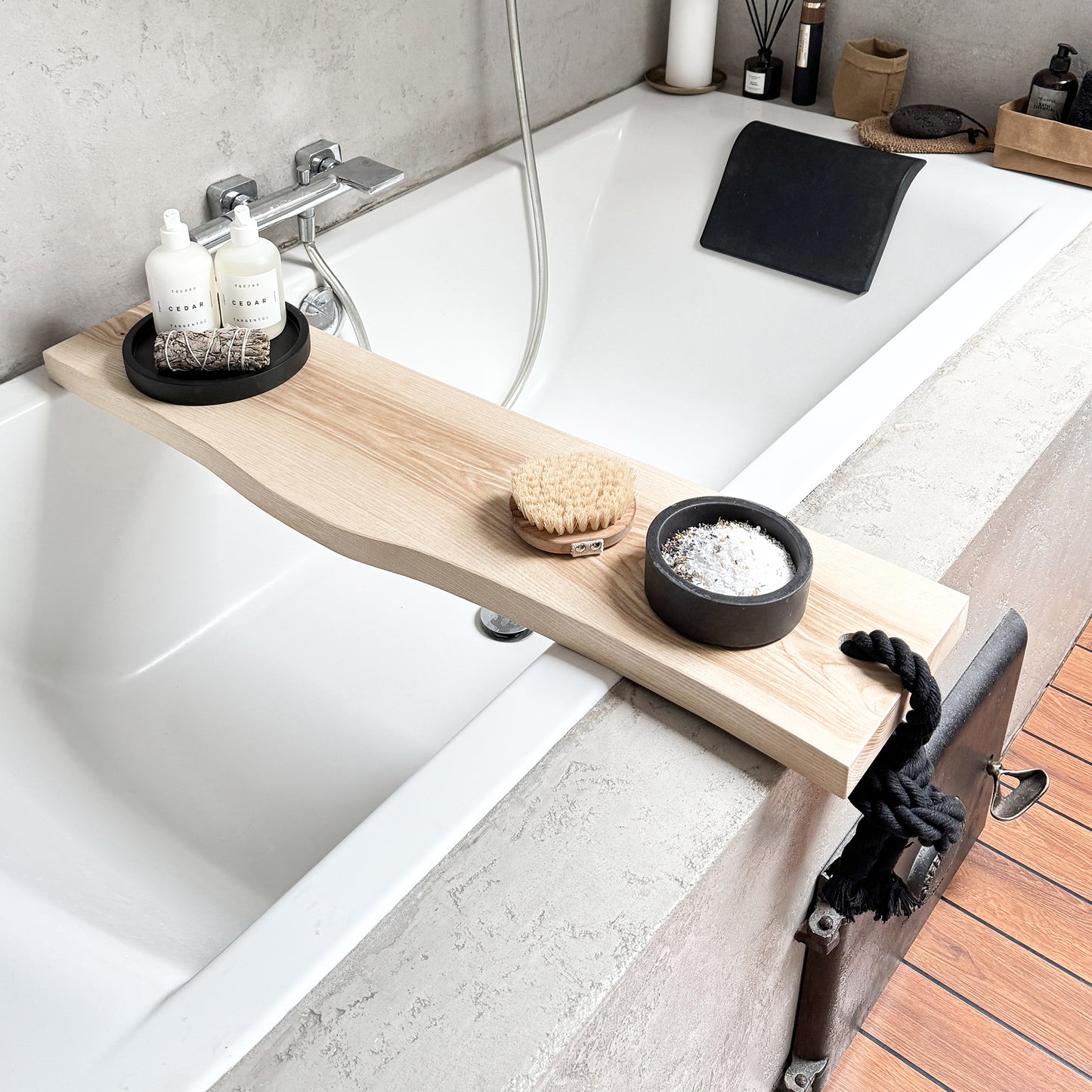 Live-edge ash wood bath caddy, black cotton rope, holds spa essentials on tub rim - top view