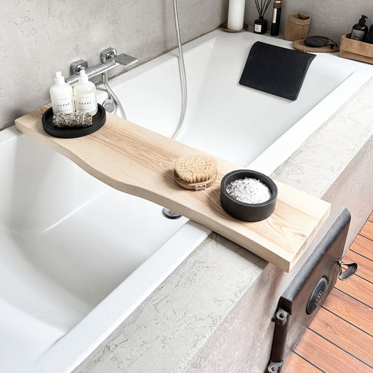 ASANA wooden bath board showing natural ash wood grain

