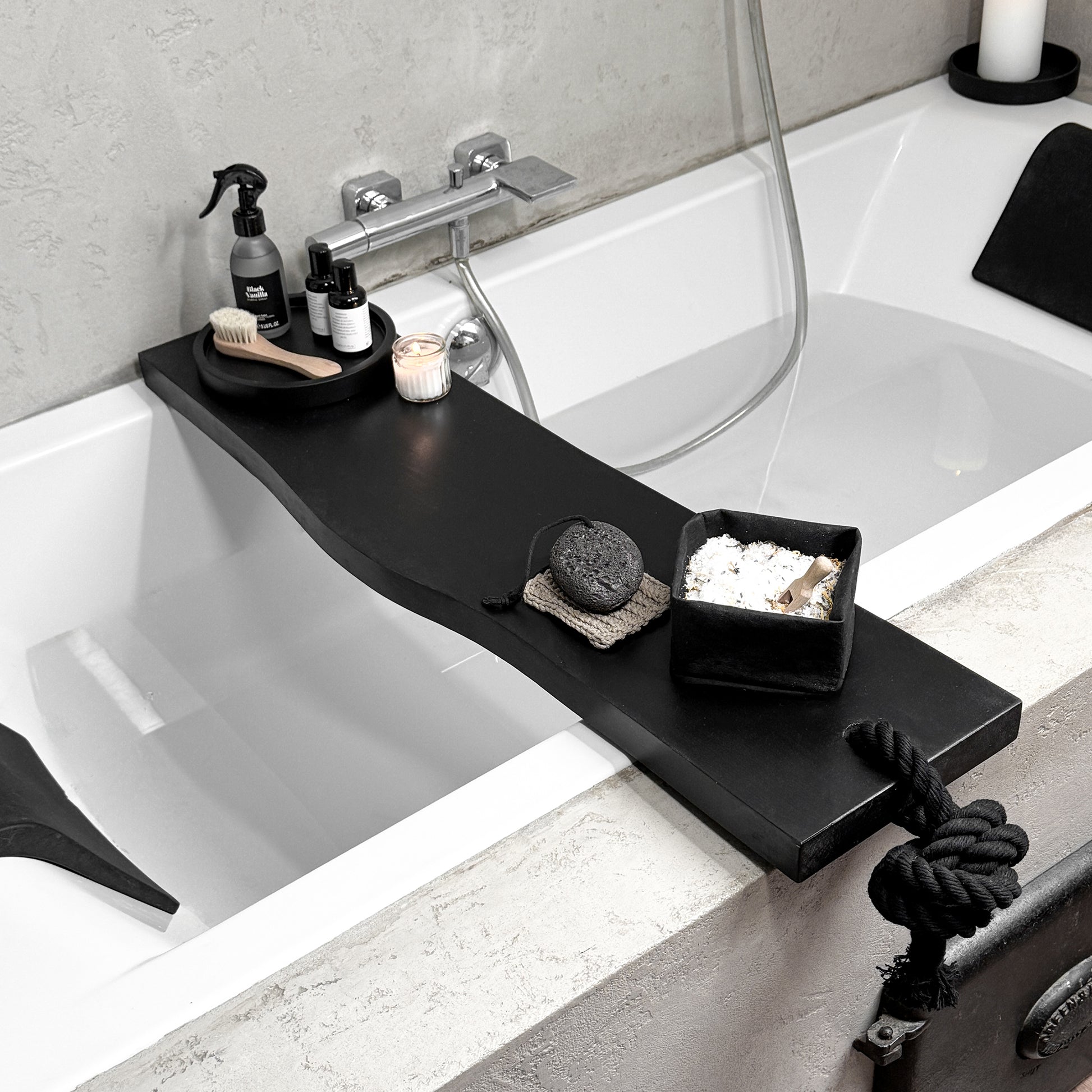 Black live-edge wood bath caddy, black cotton rope rope, top side view spa tray holding tub-side essentials