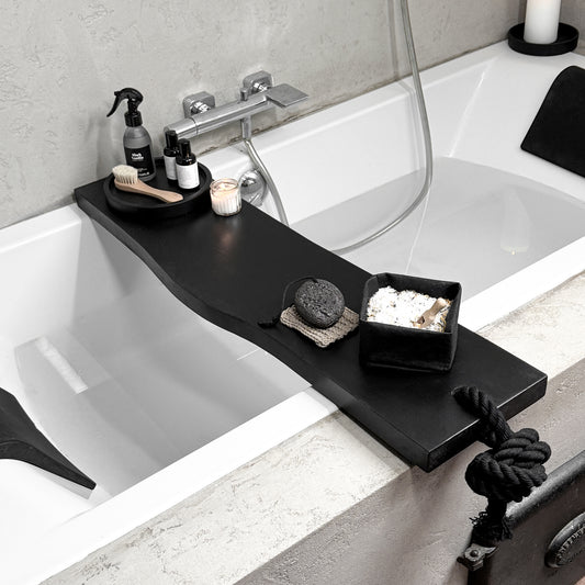 Black live-edge wood bath caddy, black cotton rope rope, top side view spa tray holding tub-side essentials