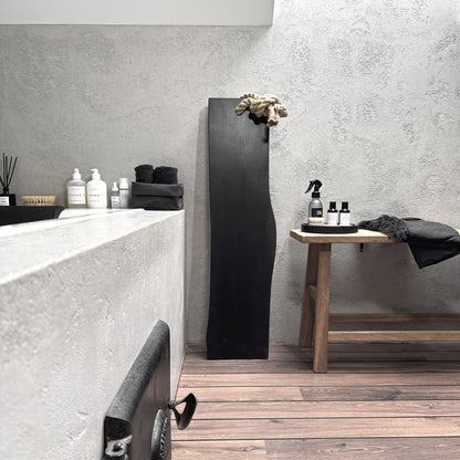 Black live-edge ash bath caddy, jute rope, wall-leaning spa-ready tray