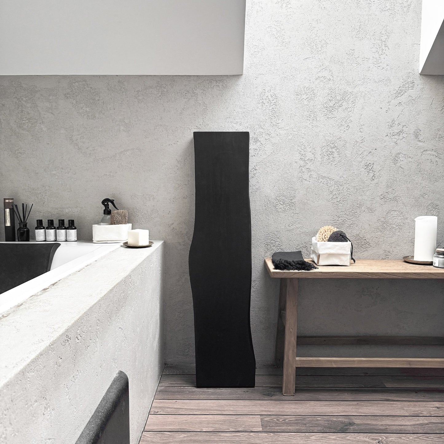 Black live-edge ash bath caddy, wall-leaning spa-ready tray