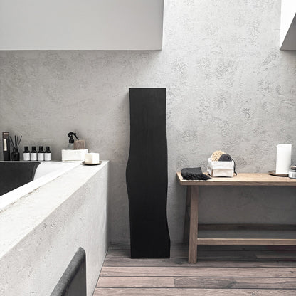 Black live-edge ash bath caddy, wall-leaning spa-ready tray