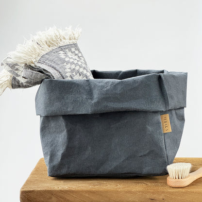 Steel washable paper bag with a towel on a wooden surface - large size