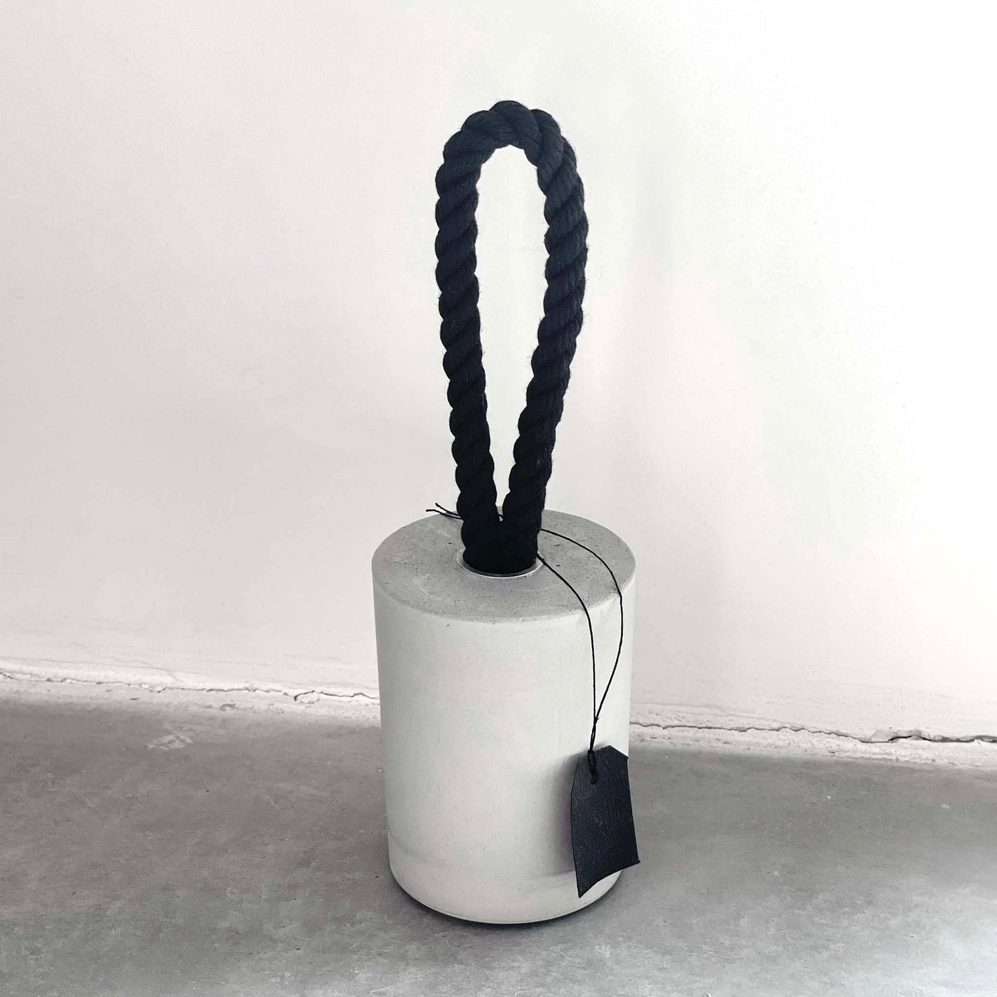 Minimalist Loop concrete door stop with cotton rope handle