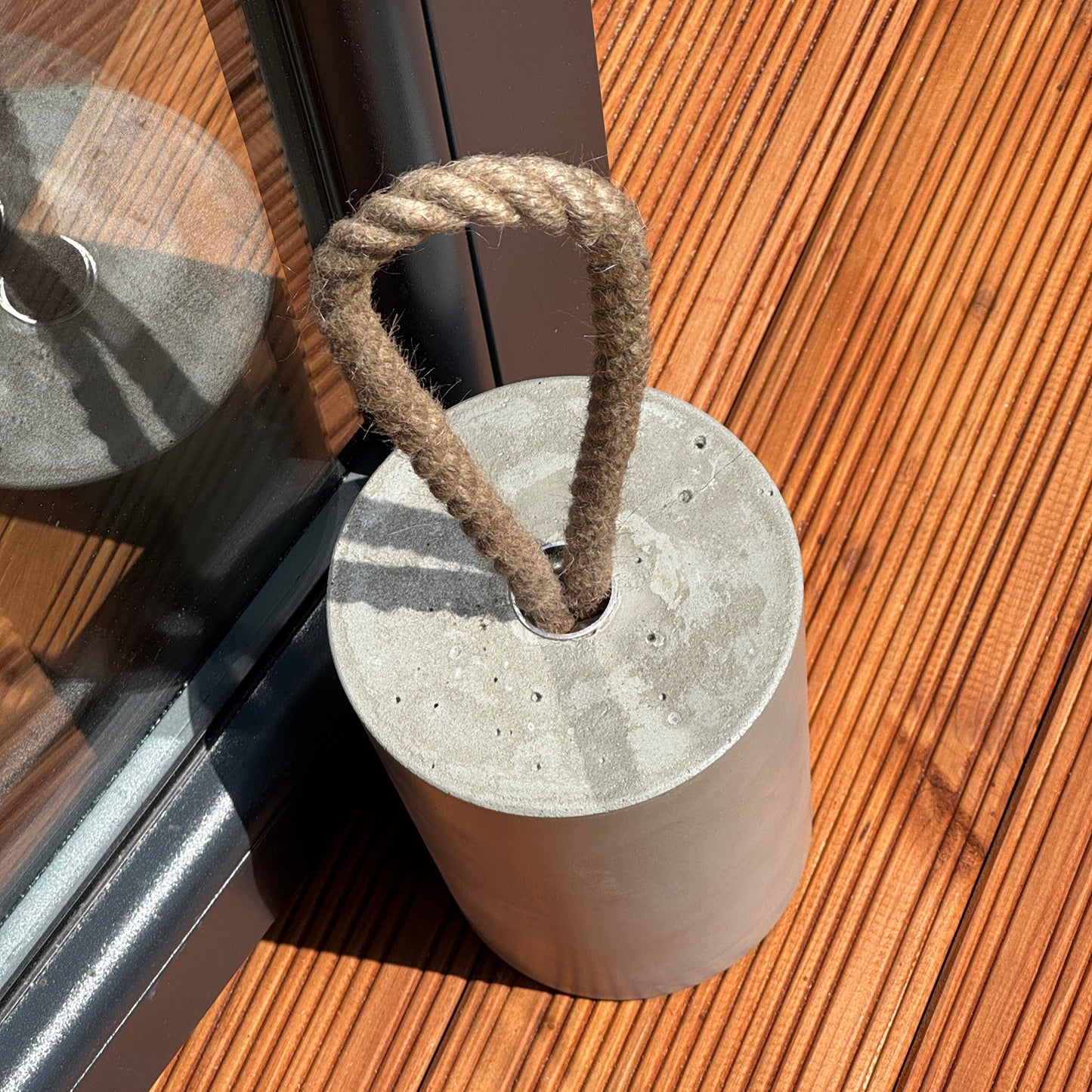 Top view Heavy concrete door stop with jute handle detail