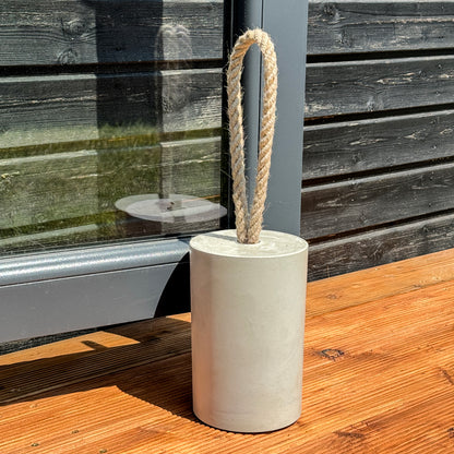 Concrete door stopper with natural rope handle minimalist outdoor decor