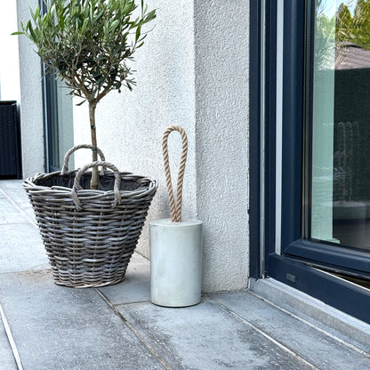 Concrete door stop with jute rope handle outdoor covered use