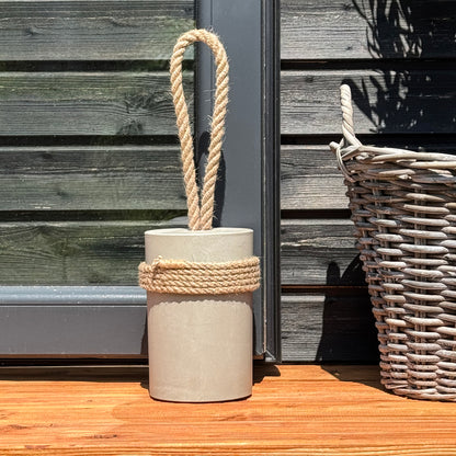 Extra large concrete door stop with jute rope handle and protective jute wrapping