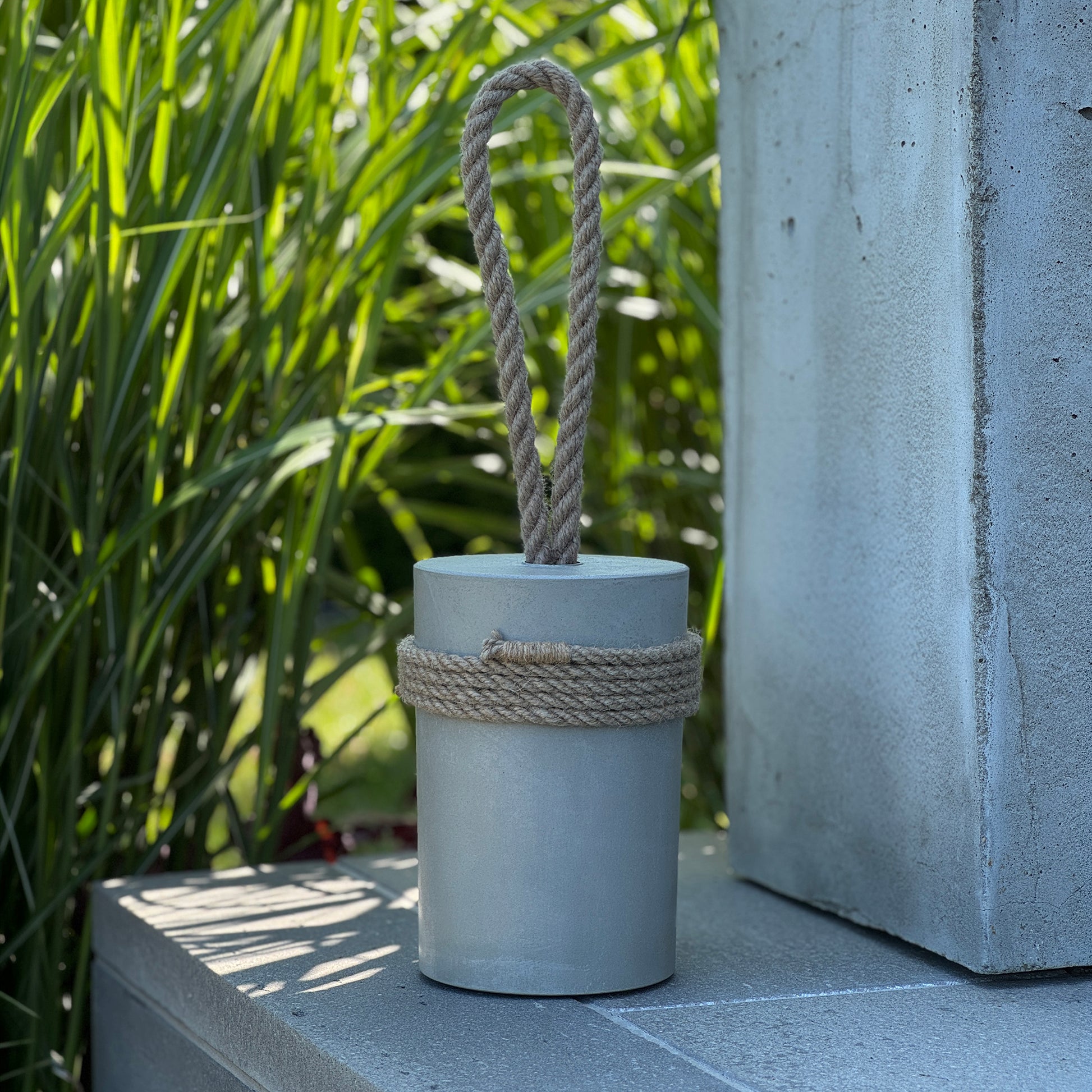Minimalist 5 kg concrete door stopper with natural jute rope and wrapped base