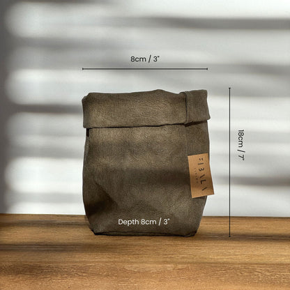 Petite olive-green washable paper bag, dimensions labeled, wood surface—eco mini tote 
