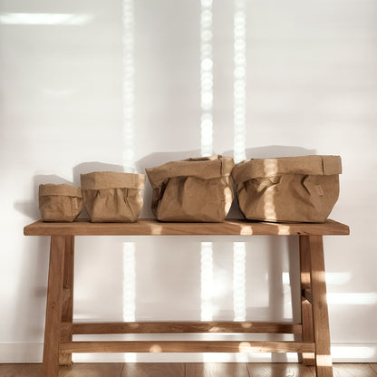 Large 4-pack brown washable paper bags, wood table, white wall—eco reusable tote set