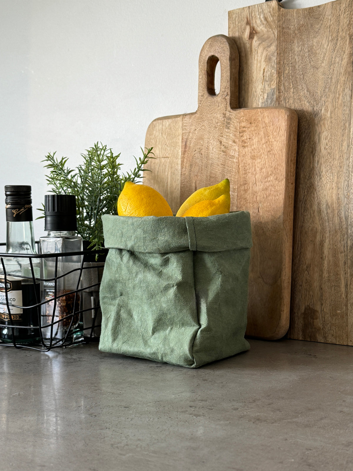 Lemons served in a small washable paper storage bag with a rolled top edge