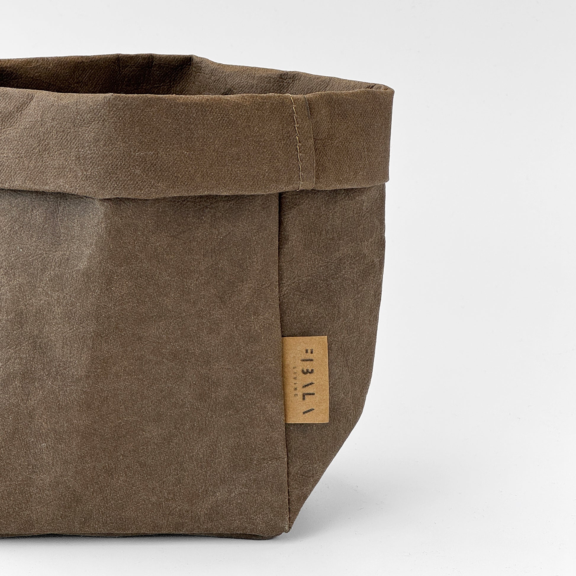 Close-up view on Small Cocoa Brown Washable Paper Bag on White Background