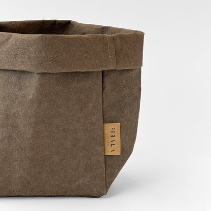 Close-up view on Small Cocoa Brown Washable Paper Bag on White Background