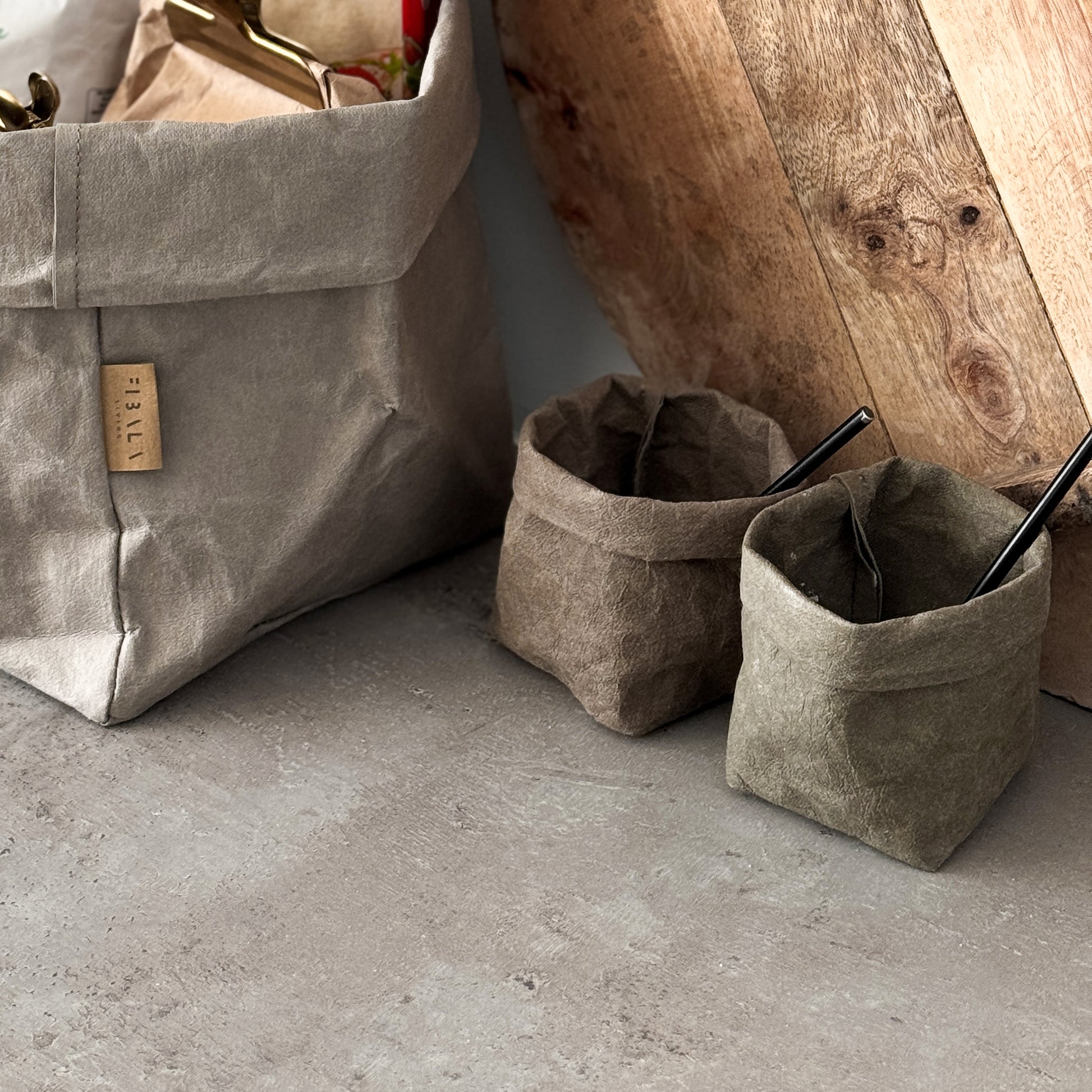 XS brown washable paper salt & pepper bags, black spoon, concrete counter—eco chic mini set