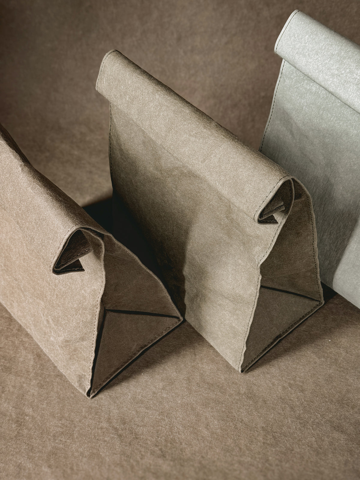 Close view of washable paper lunch bags with the top rolled down