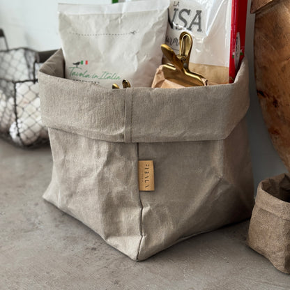 Chino washable paper bag with a label on a concrete kitchen counter
