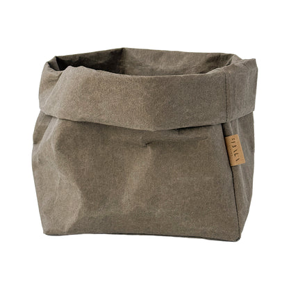 Olive green washable paper bag with a visible brand label on a white background