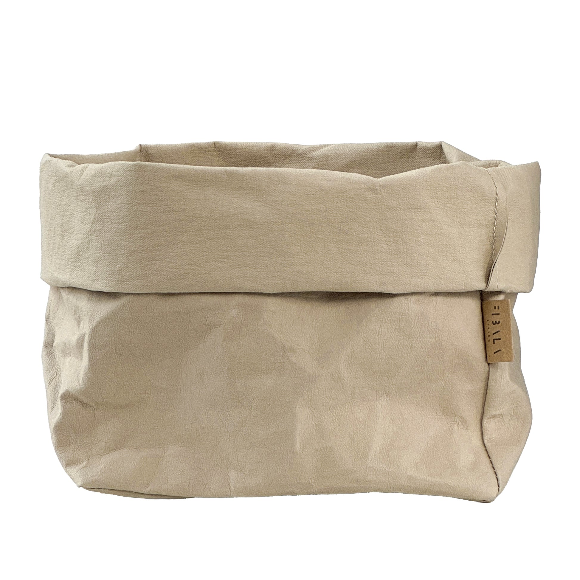 Sand beige washable paper bag with a visible brand tag on a white background