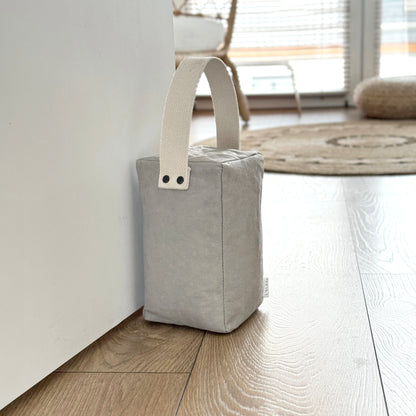 Portico washable paper door stop in modern minimalist interior
